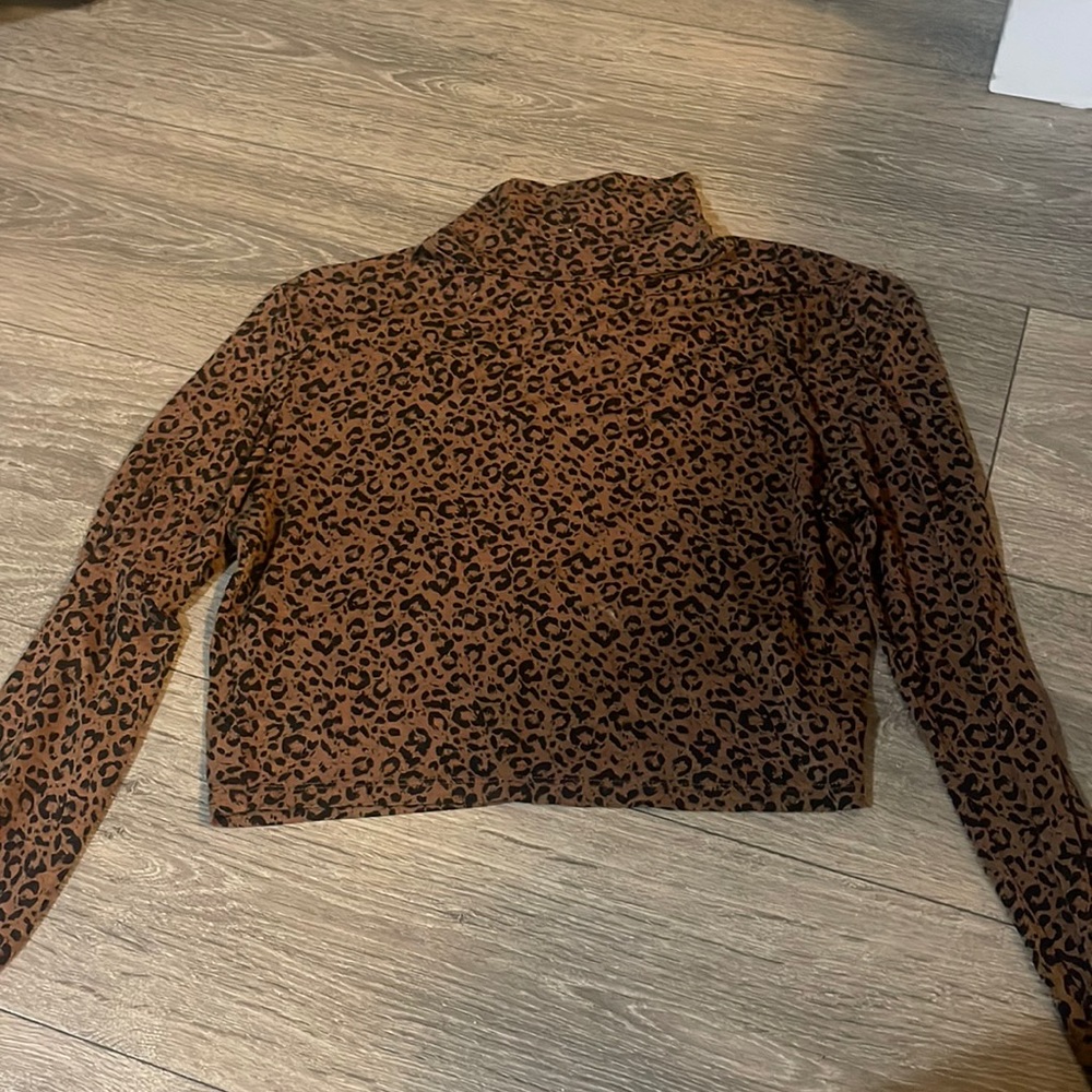 Animal printed turtle neck